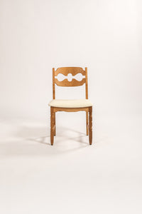 Henning Kjaernulf Mid-Century Danish Oak Dining Chair with Boucle Upholstery