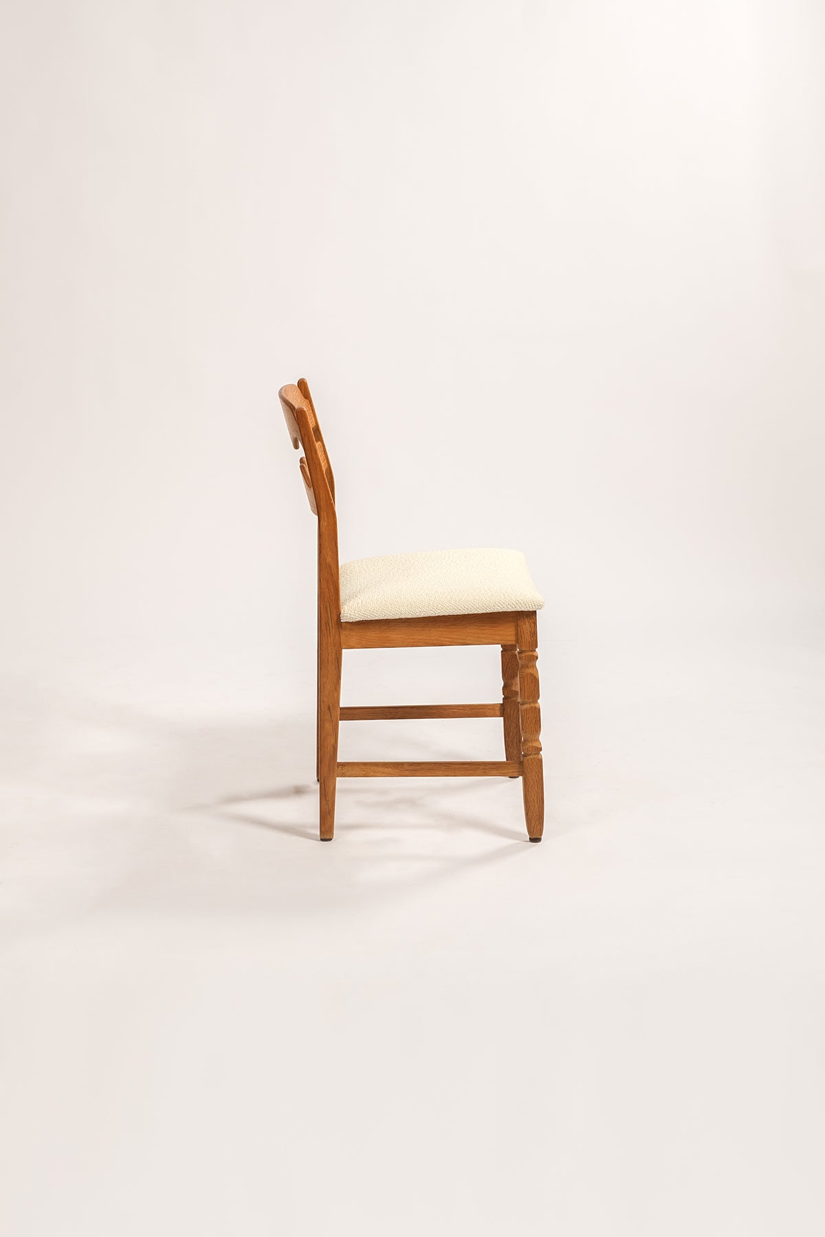 Henning Kjaernulf Mid-Century Danish Oak Dining Chair with Boucle Upholstery